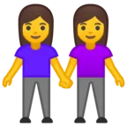 Dos mujeres tomados de la mano